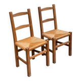 2 solid wood and straw chairs
