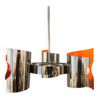 Hanging lamp in chromed metal with orange contrast lacquer and three light sources.