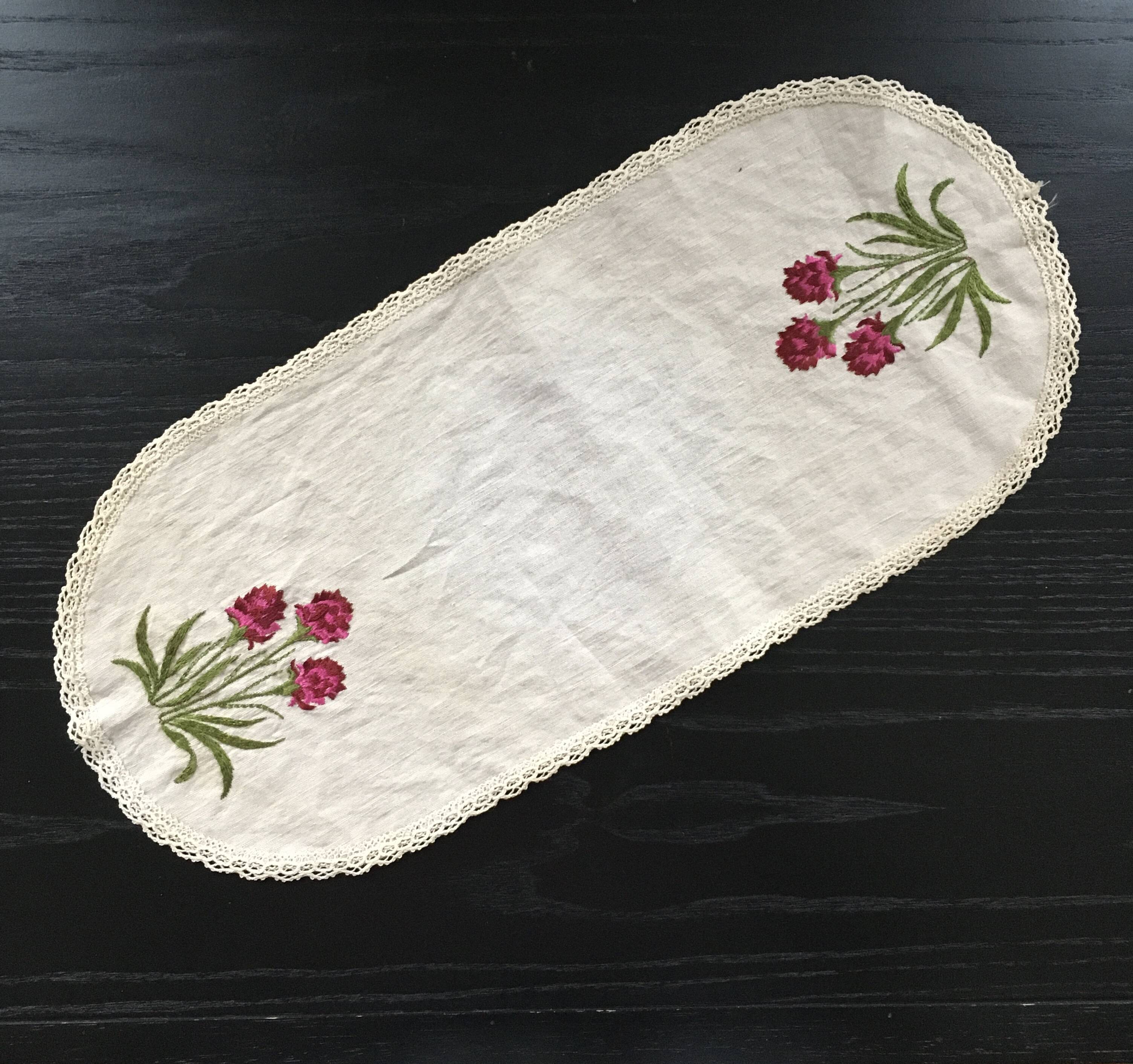 Embroidered red flower doily