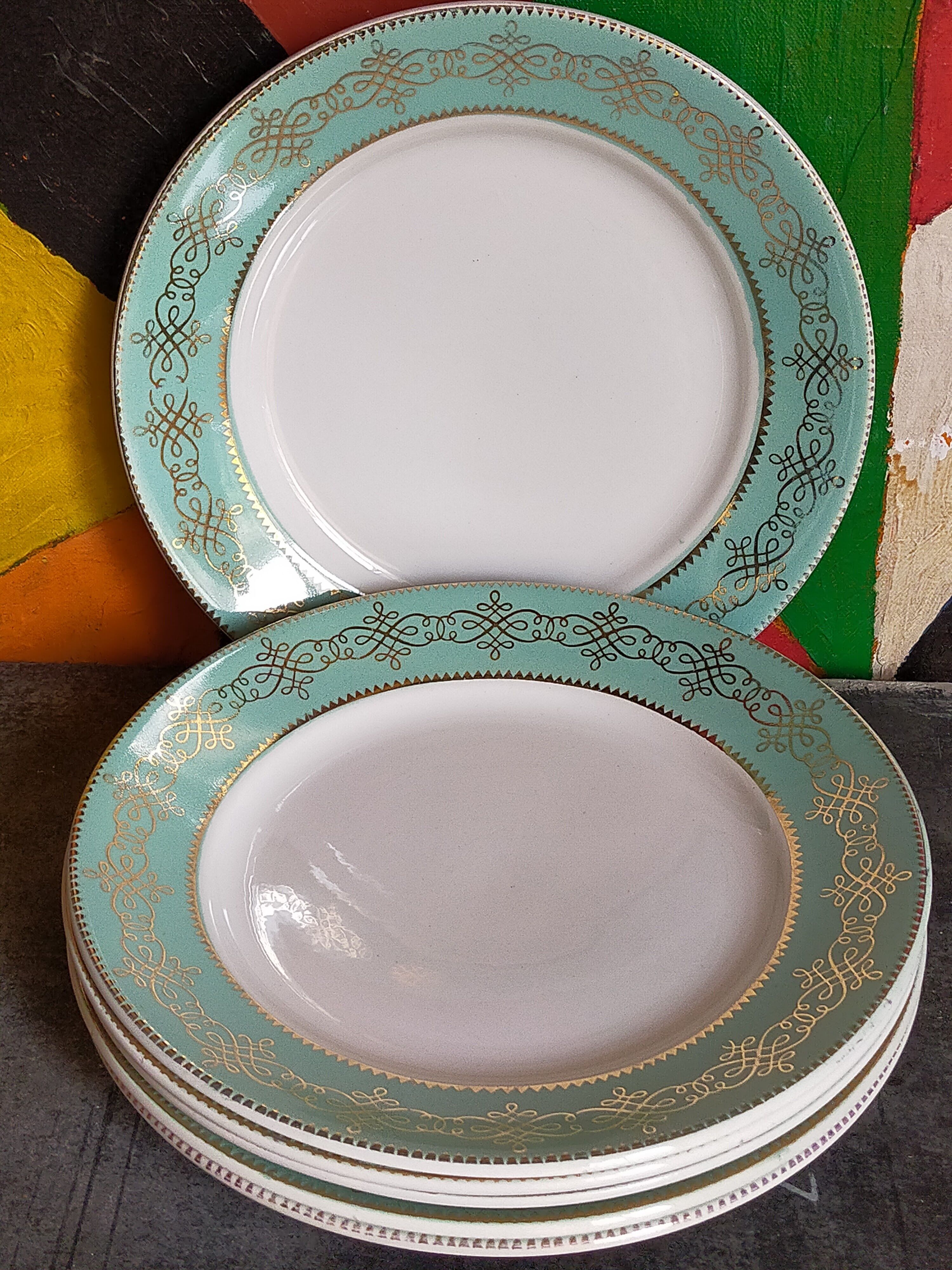 Six plates of vintage Badonviller earthenware with gold frieze