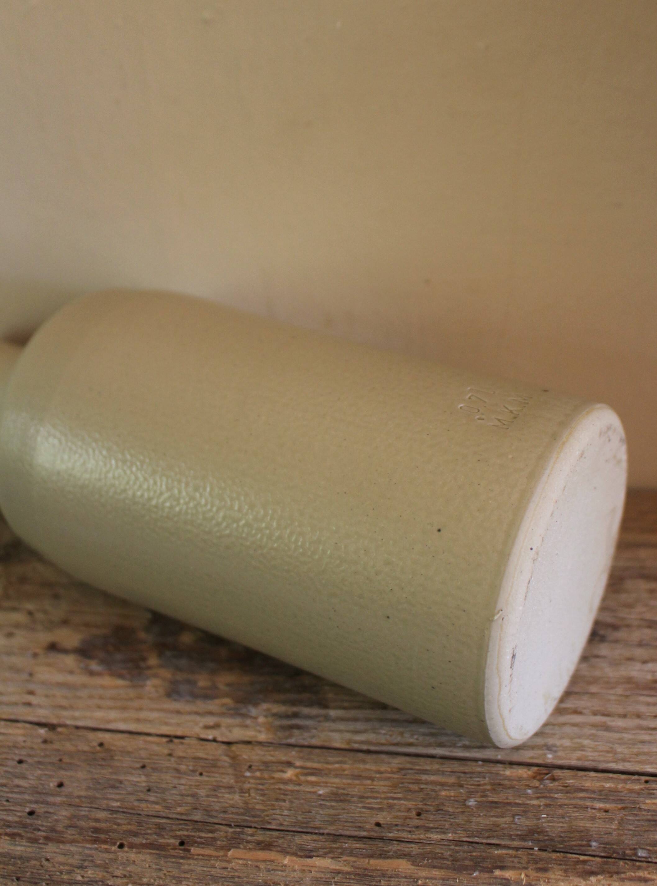Vintage light stoneware liqueur bottle