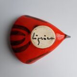 Empty orange enamelled pocket bird years 70