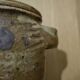 Sandstone pot with handles hands