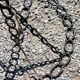 Vintage floor lamp from the 50s in blackened iron in the shape of a chain