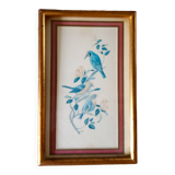 Painting with birds in an old golden frame