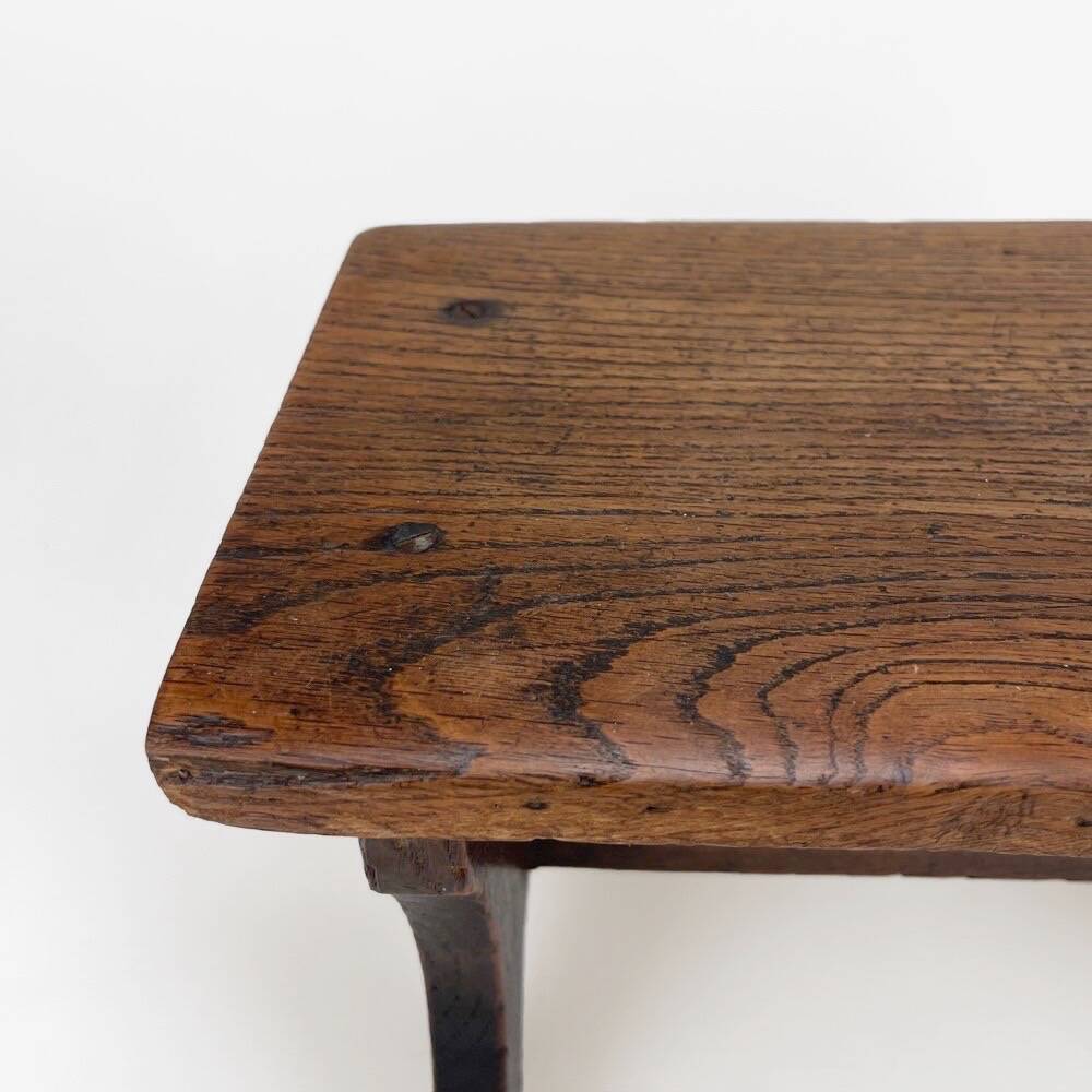 Small old wooden bench or footstool