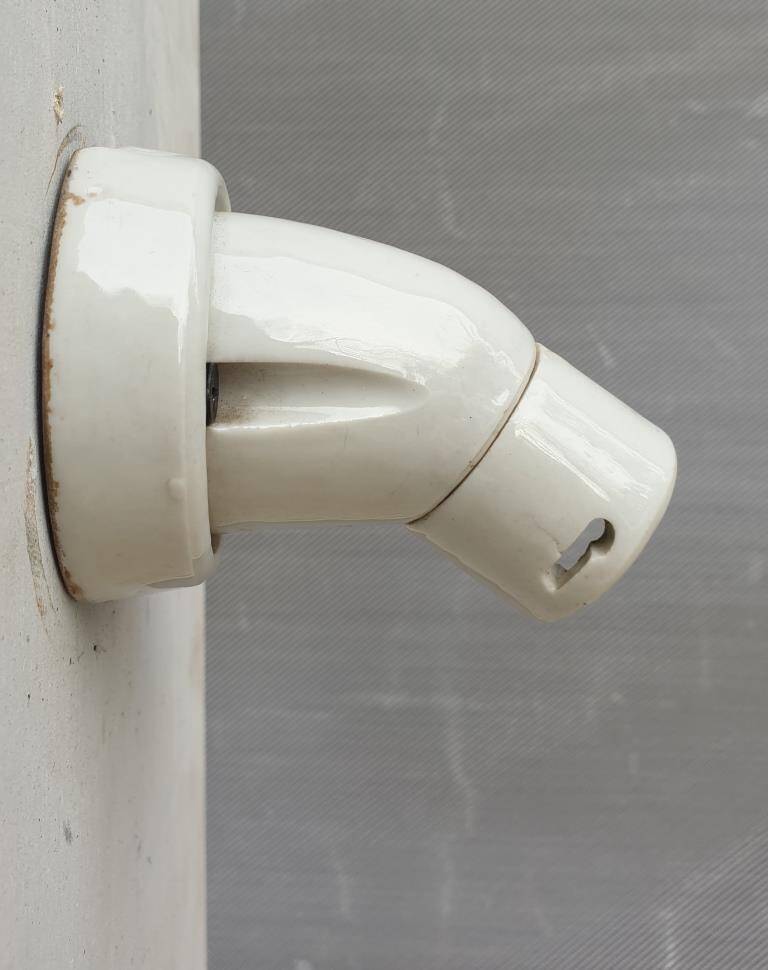 Minimalist elbow wall lamp Art Deco porcelain