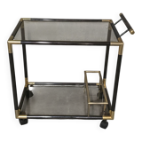 Black metal and brass rolling dessert trolley, smoked glass, 1970s.