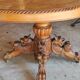 Oval oak table with carved details - known as a hunting table.