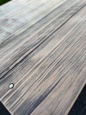 Old table with patinated green legs