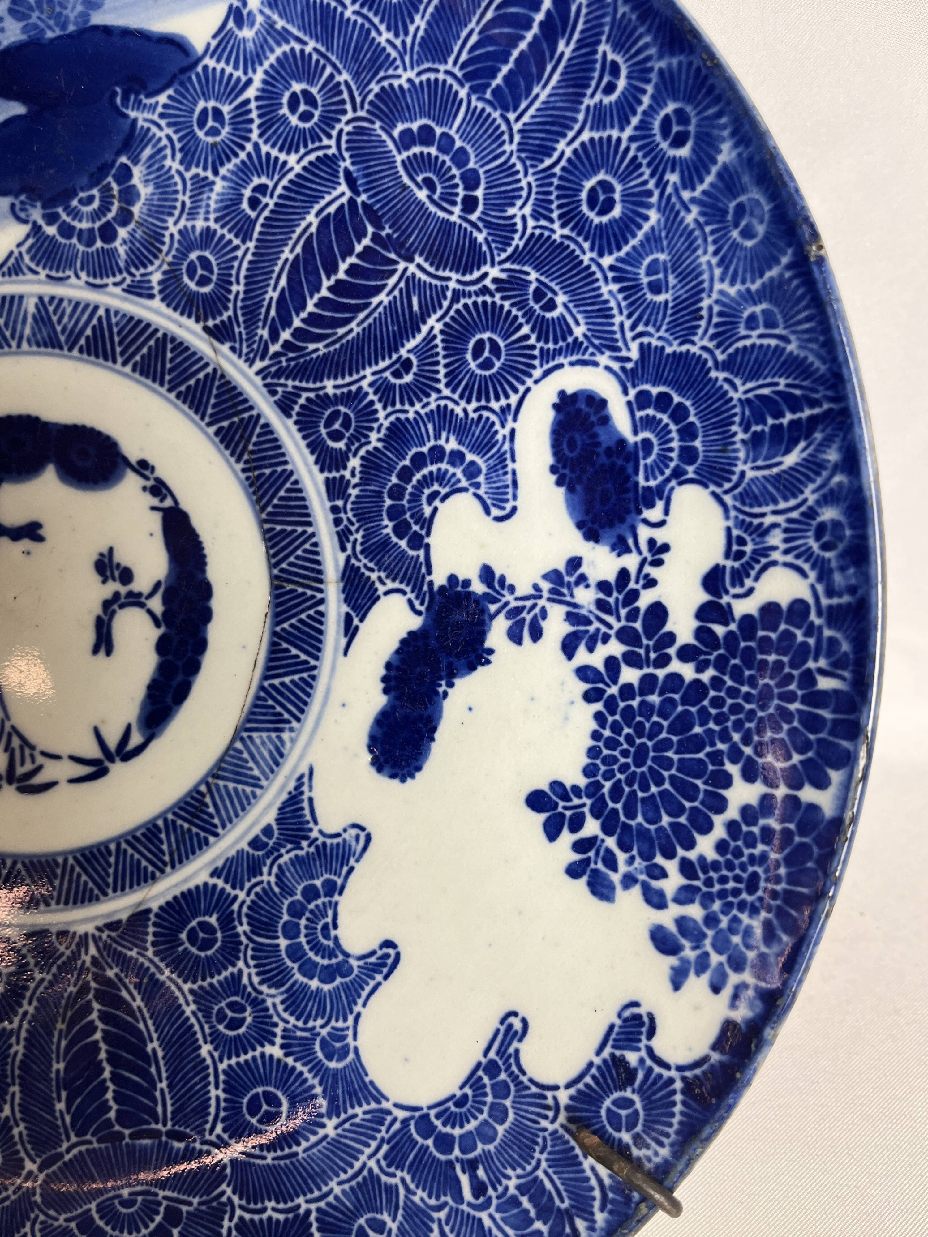 Japan, large white and blue porcelain plate from the 19th century.