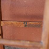 Set of 5 mismatched straw chairs.