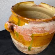 Old grease pot in glazed yellow terracotta, France nineteenth century