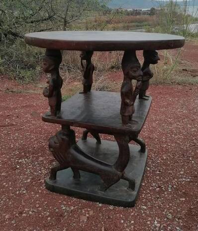 Chair and table of a dignitary in carved wood from Benin, 1950