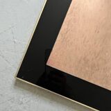 Large brass mirror and pink glass circa 1970