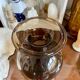 Vase boule en verre fumé