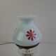 1960s Czechoslovakian milk glass oil lamp style table lamp with red windmill