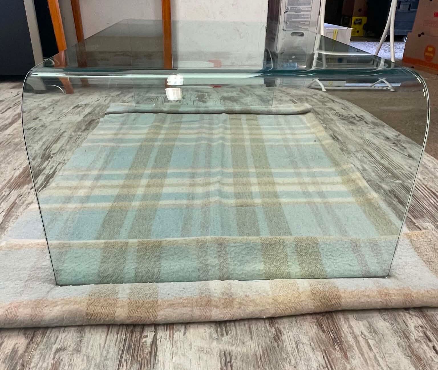 Curved glass design coffee table