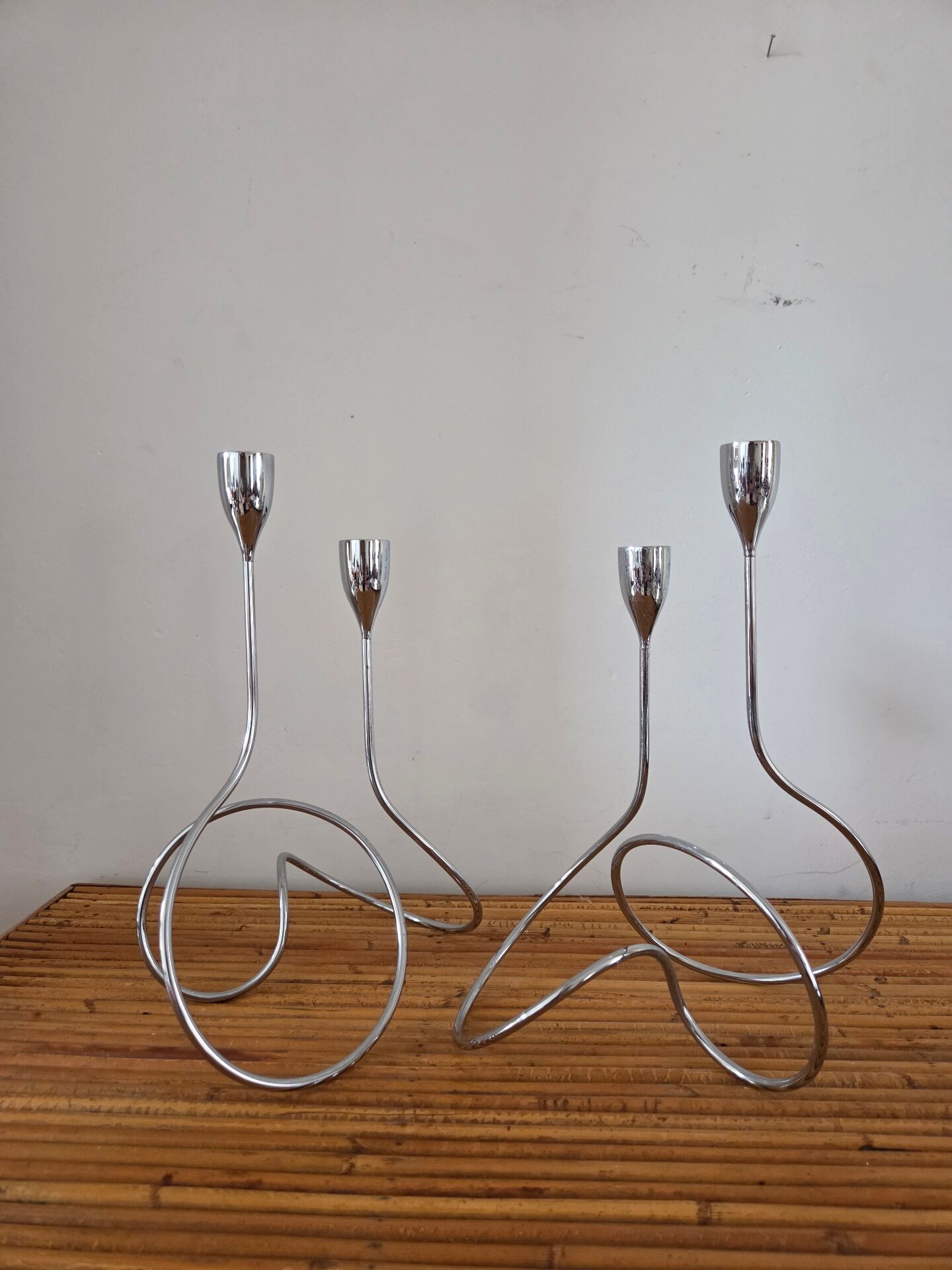 Pair of vintage chrome metal candlesticks
