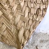 Braided palm leaf eventail