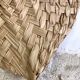 Braided palm leaf eventail
