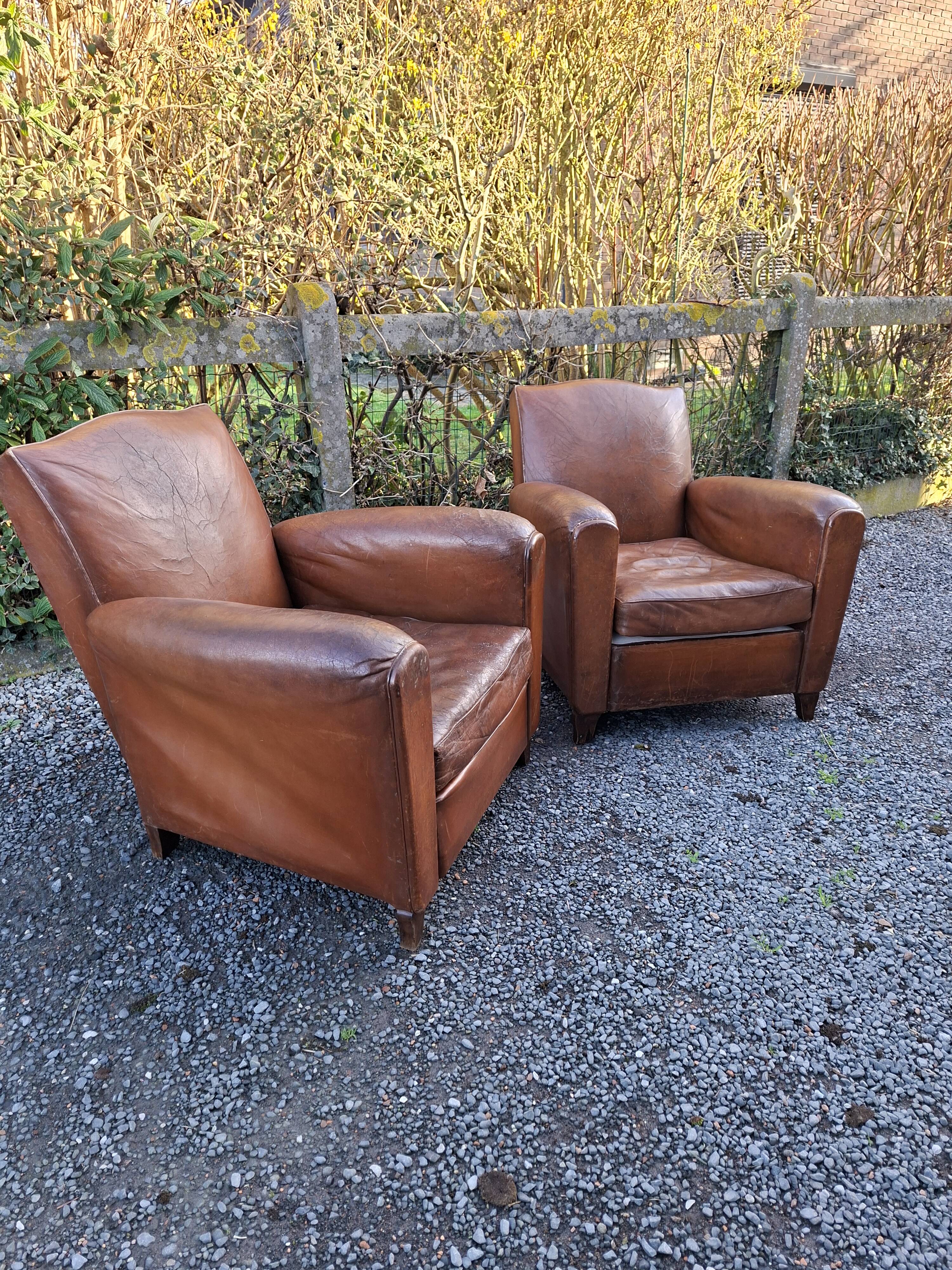 A couple of pairs of genuine restored club armchairs in industrial loft leather.