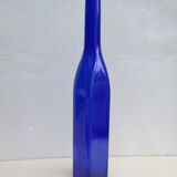 Blue glass bottle, square