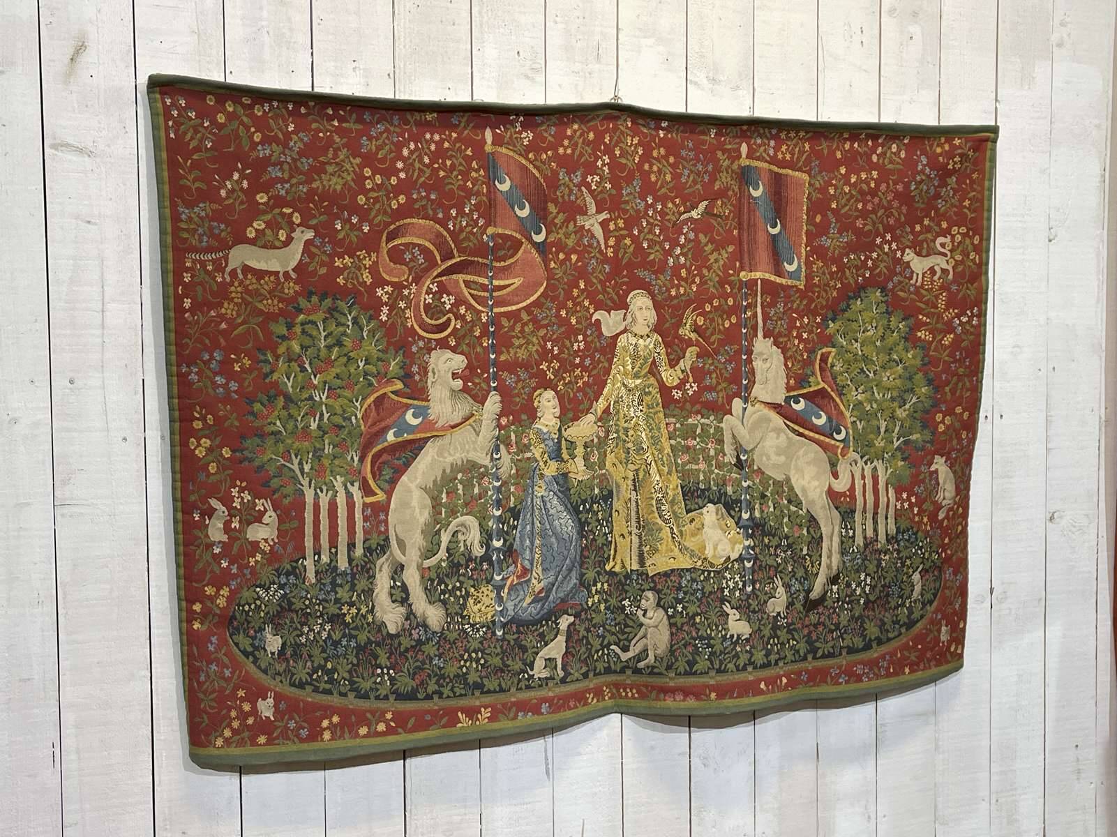 Medieval-style handmade tapestry, named Lady with the Unicorn.