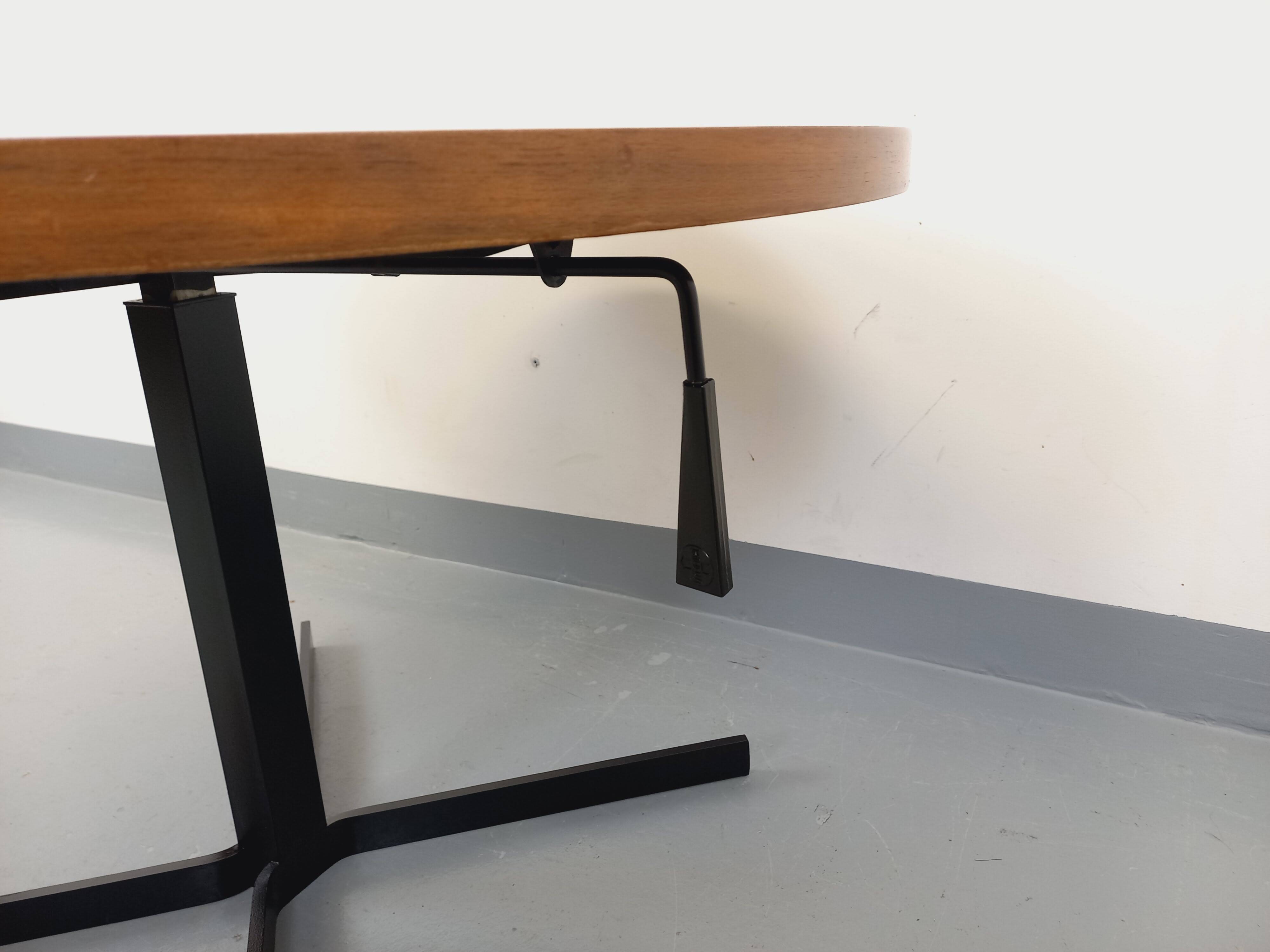 Large round coffee table in vintage Scandinavian style, modular into a table.