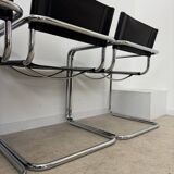 Lot of 4 tubular metal and black leather chairs MG5 Grassi style 70s