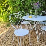 Renovated round table and garden armchairs