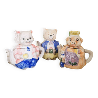 Trio of small vintage animal-shaped teapots
