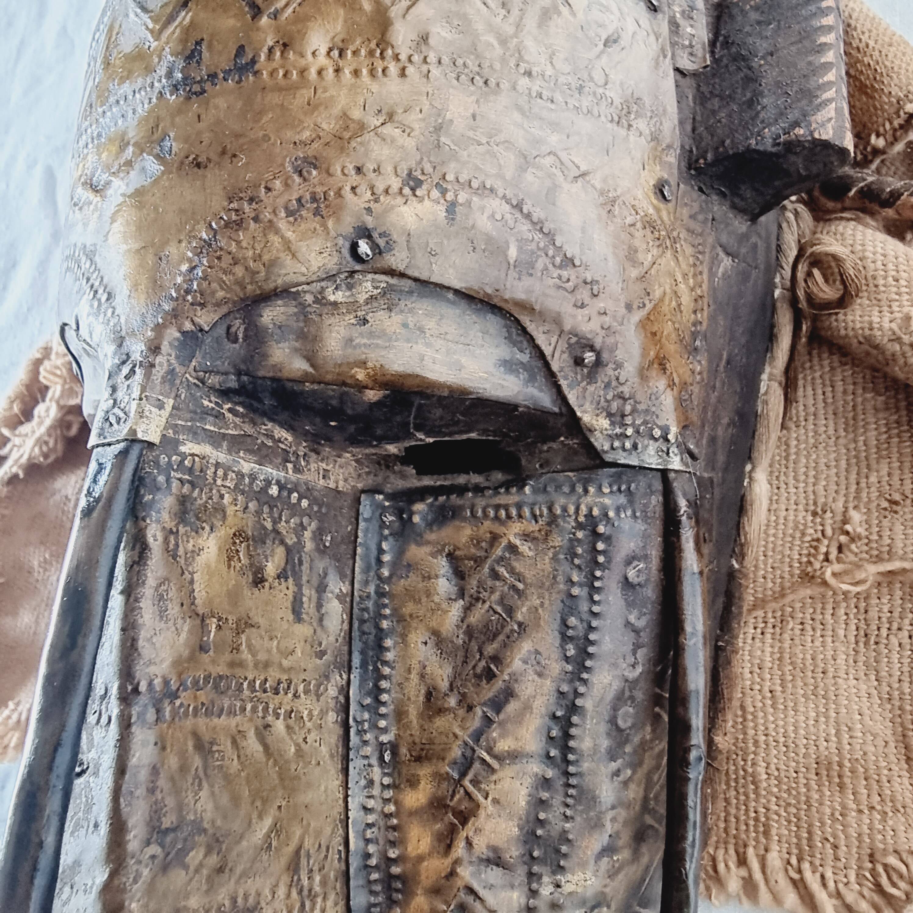 African mask from Mali from the N'Tomo tribe of Marka covered in chiseled brass