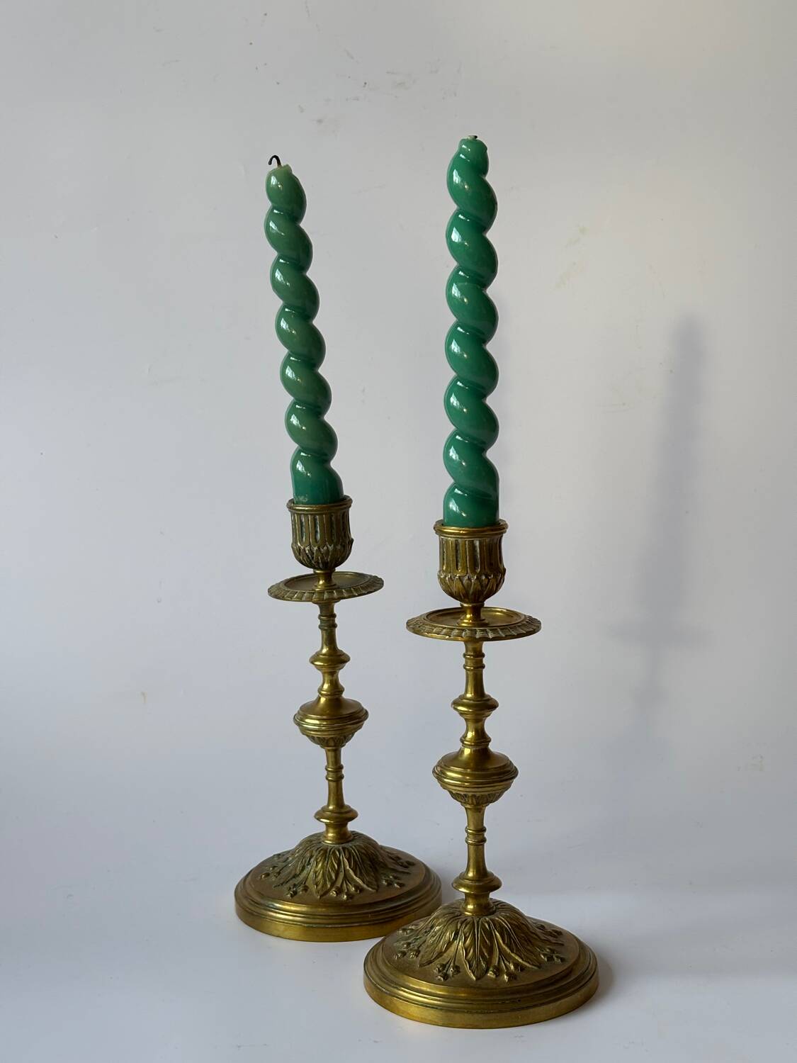 Pair of neoclassical brass candlesticks