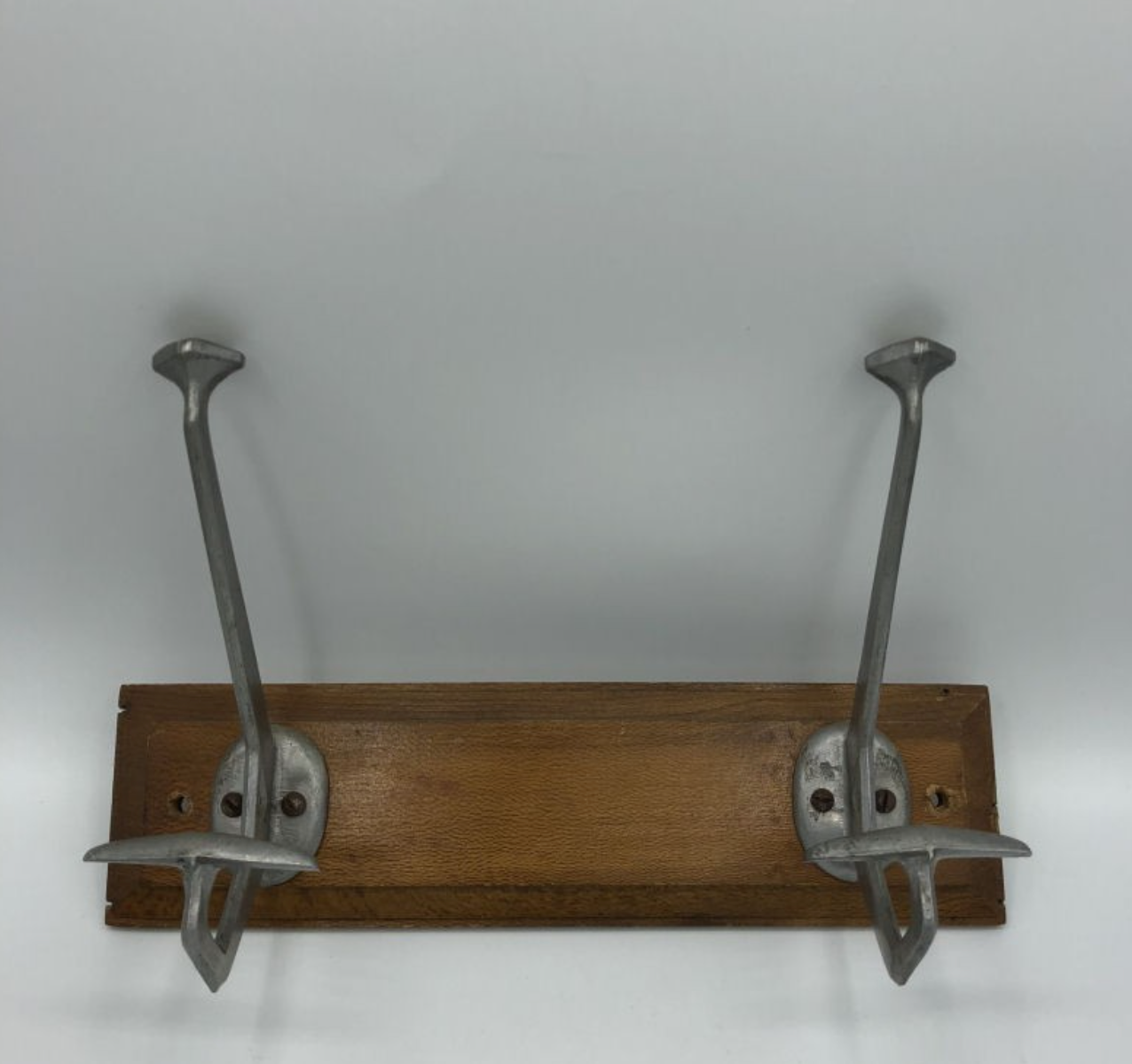 Wall coat rack with 2 hooks on wood