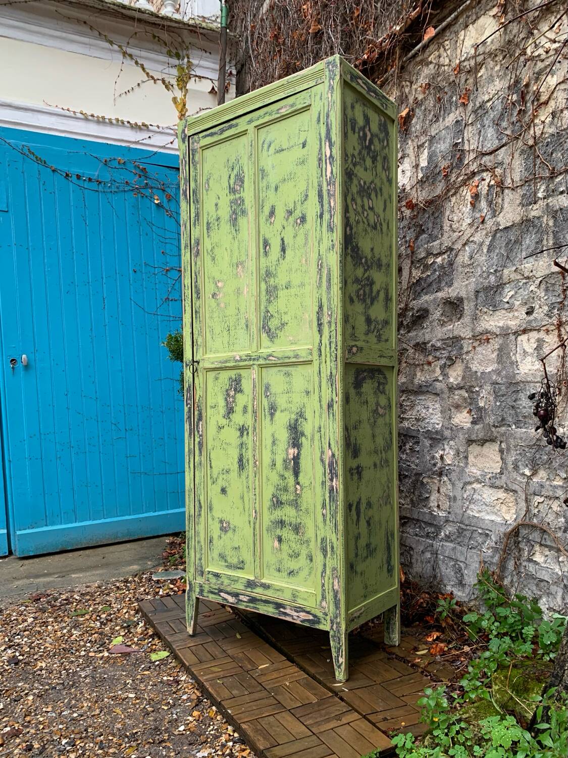 Antique Parisian bonnet wardrobe with khaki patina