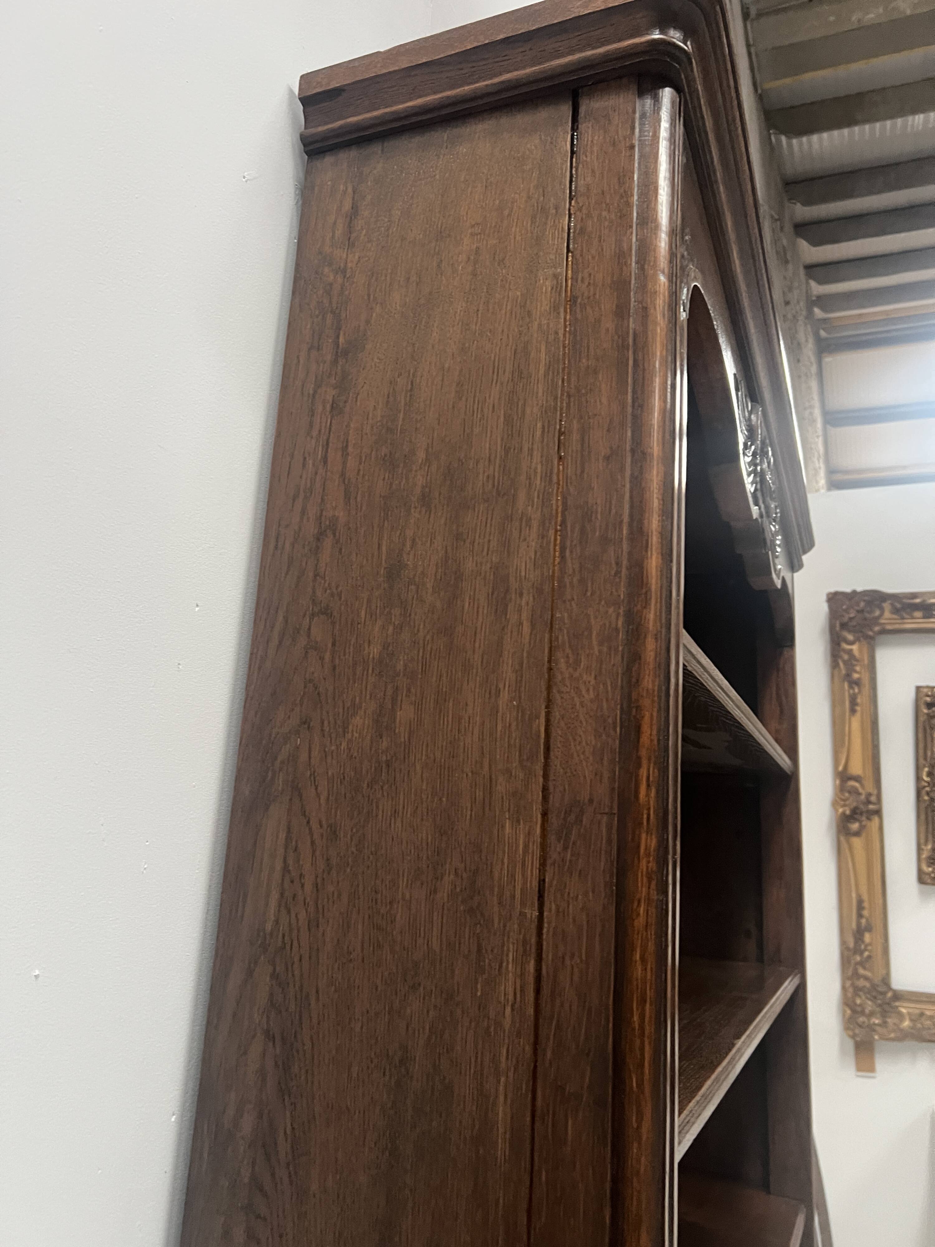 Wall library in two sections in Louis XV style made of solid oak, 20th century.