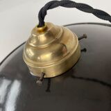 Old black enamelled industrial suspension