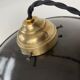 Old black enamelled industrial suspension