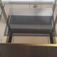 Double tray side table in brass and smoked glass.