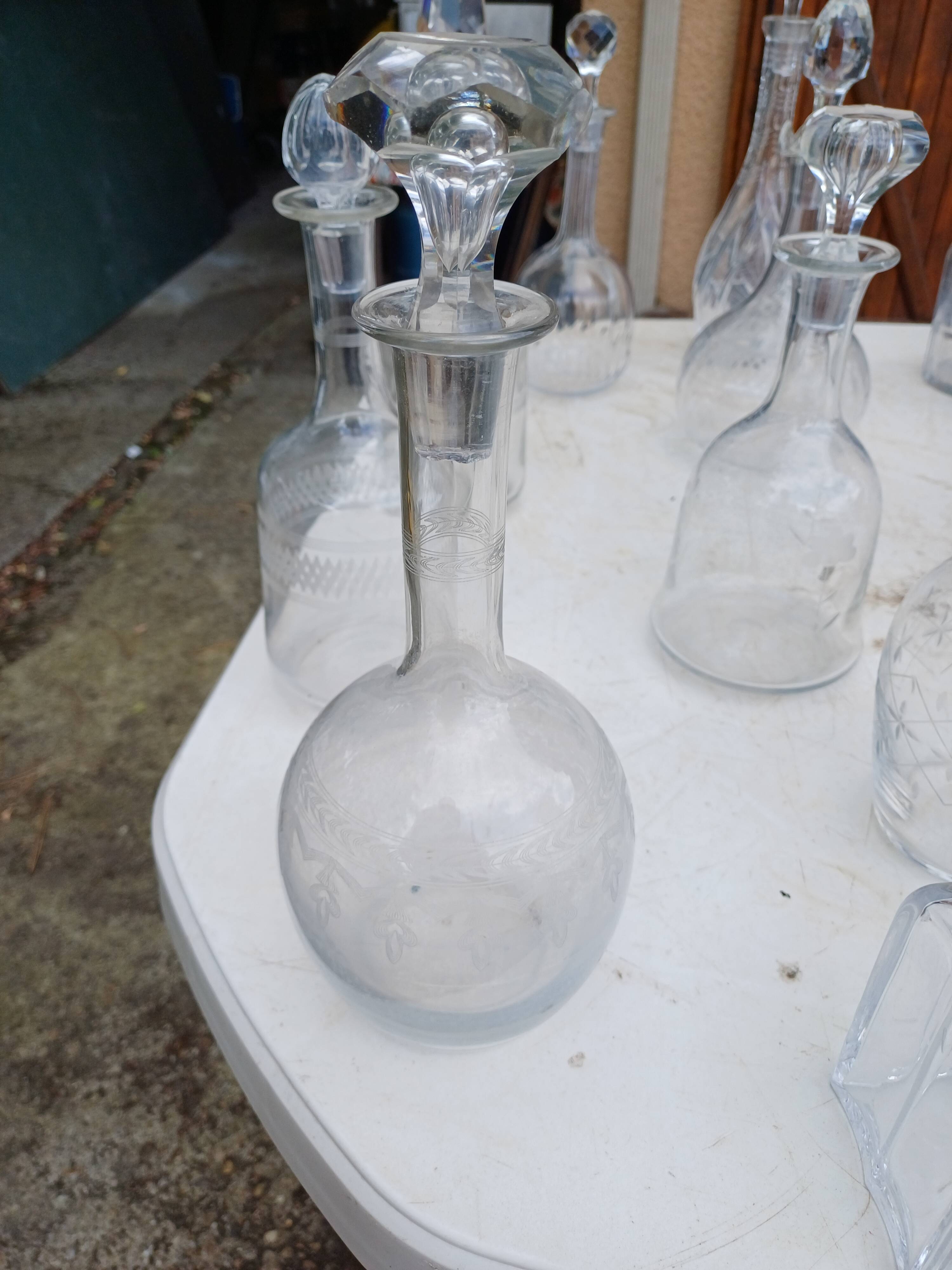 Set of 18 glass and crystal carafes