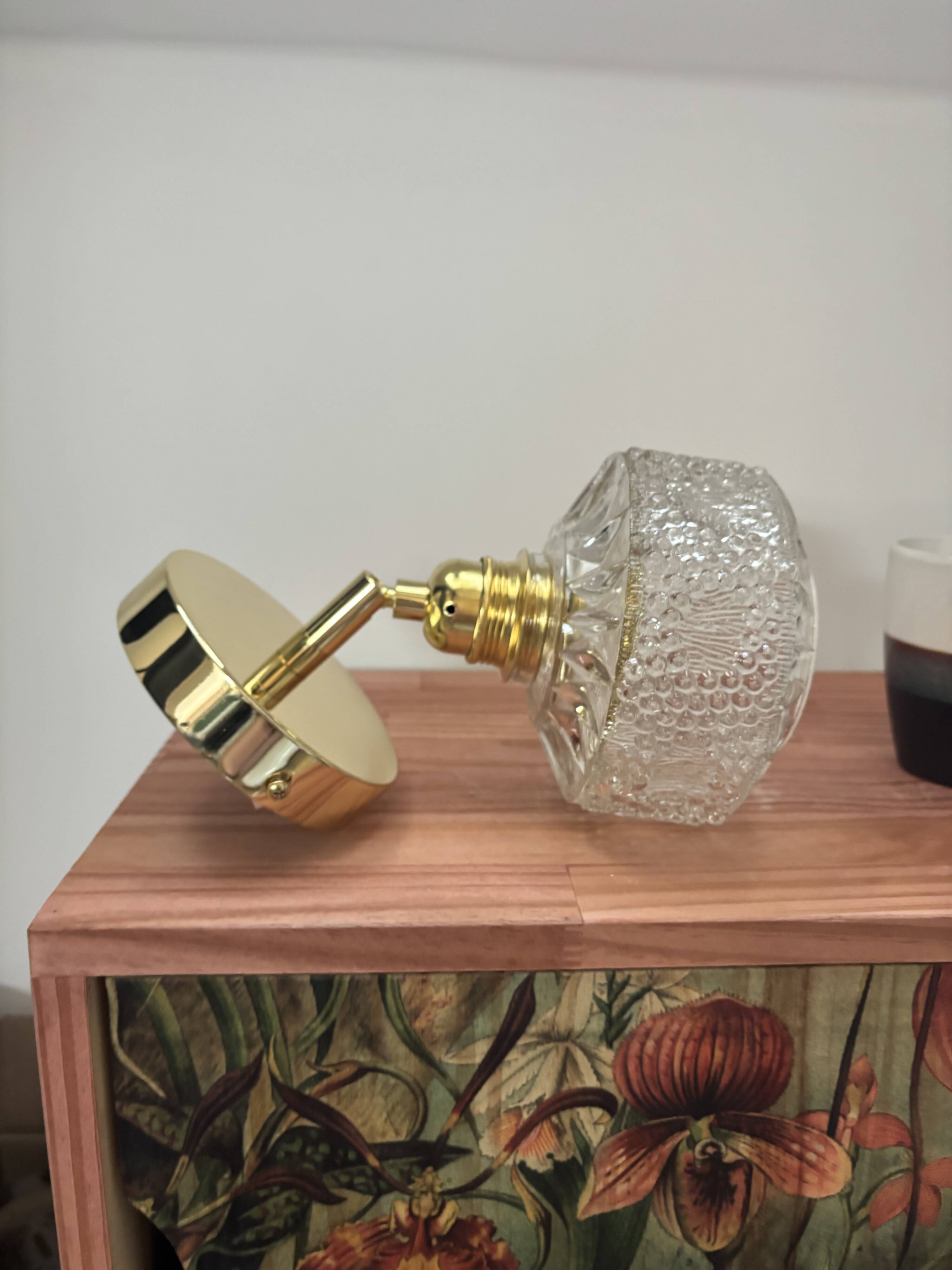 Gold tilting wall light