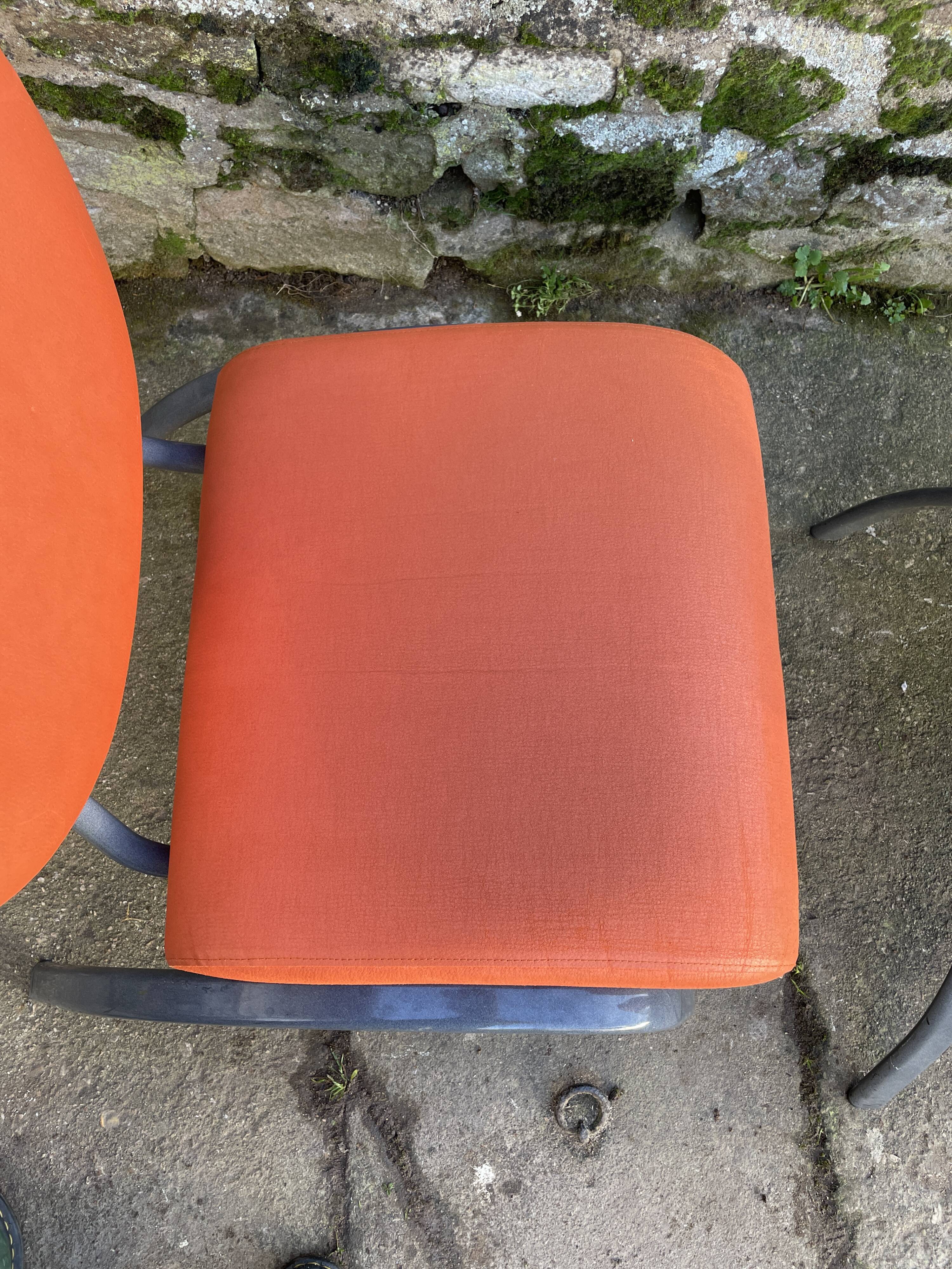 Pair of faux leather armchairs