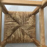 Wooden stool with straw seat