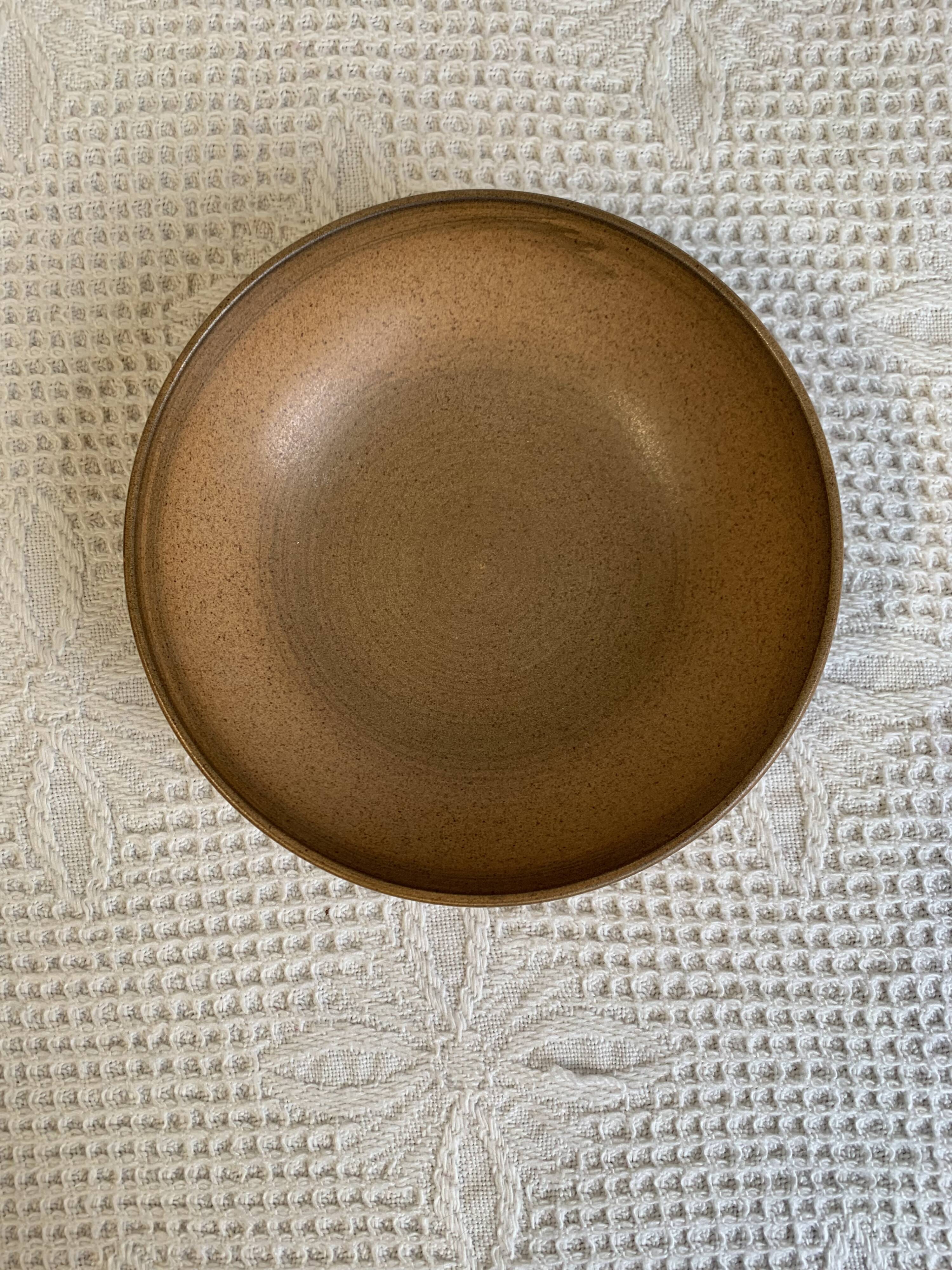 Longchamp glazed stoneware salad bowl, dating from the 1970s, in brown tones