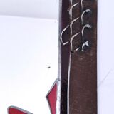 Brutalist mirror in metal and set glass