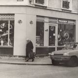 Vintage silver gelatin print of a street scene in a shop window, 1970s, framed, 52 x 42 cm