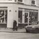 Vintage silver gelatin print of a street scene in a shop window, 1970s, framed, 52 x 42 cm