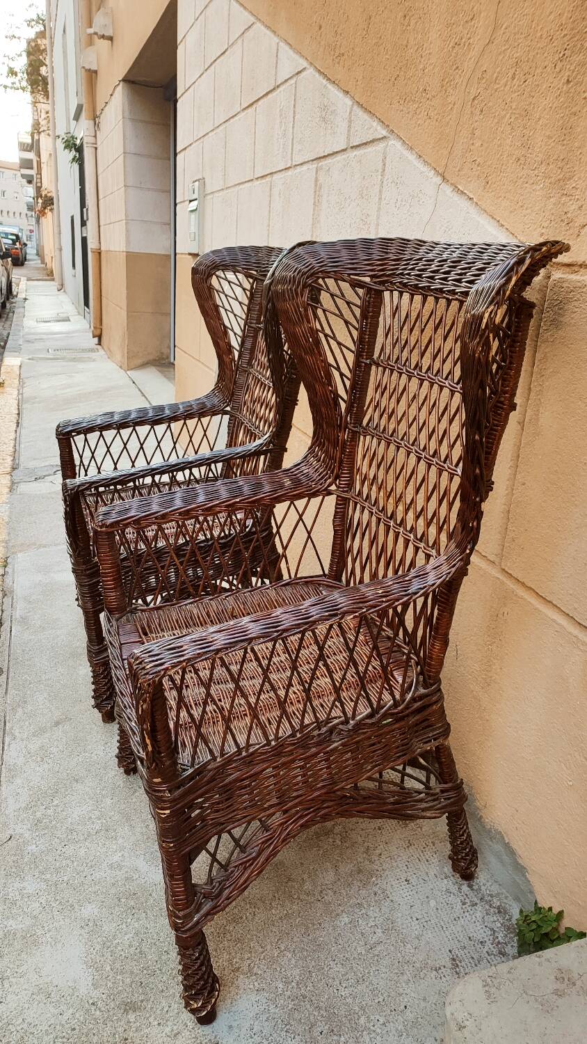 Duo of rattan wing chairs