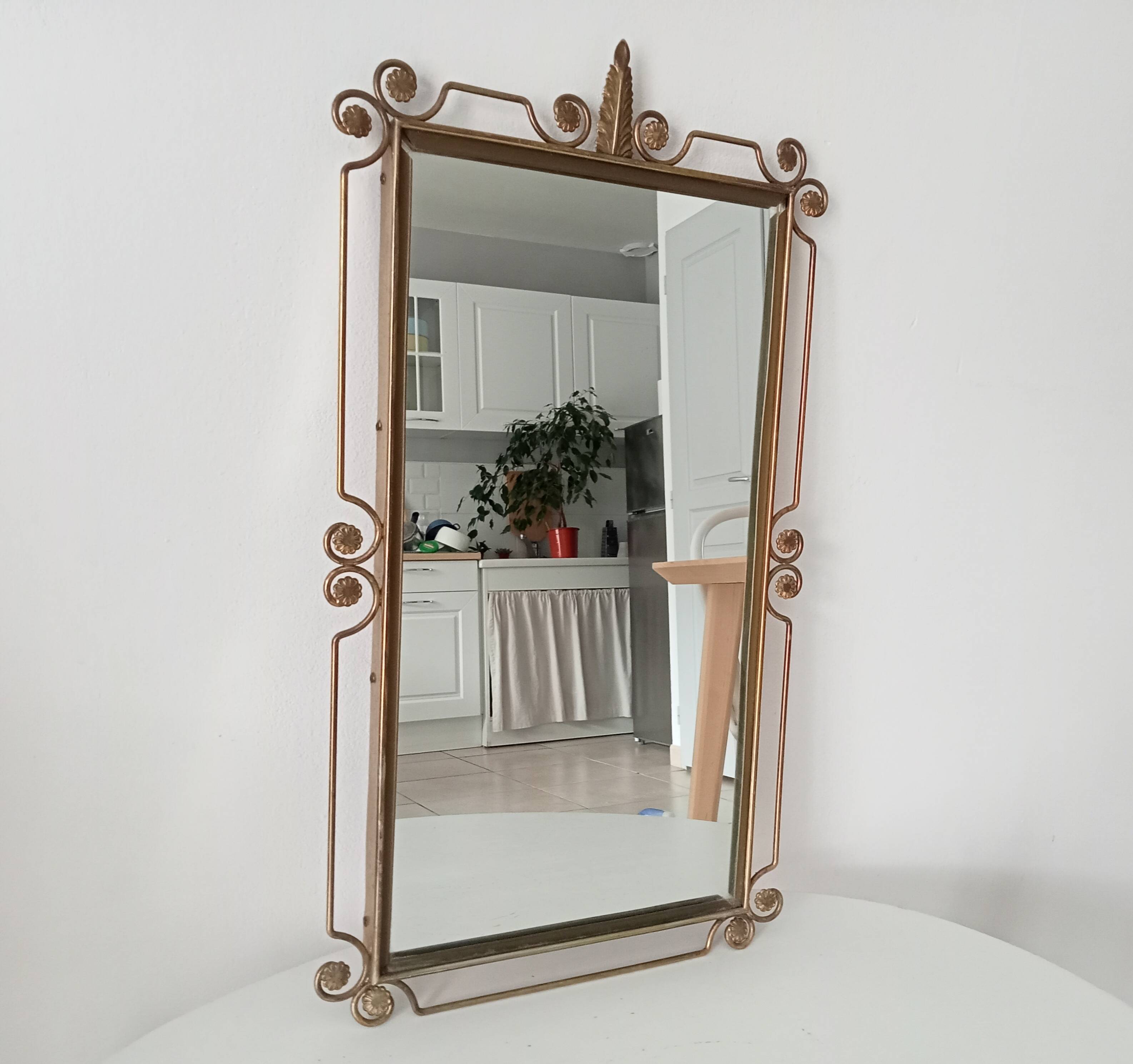 Vintage Hollywood Regency mirror from the 1950s.